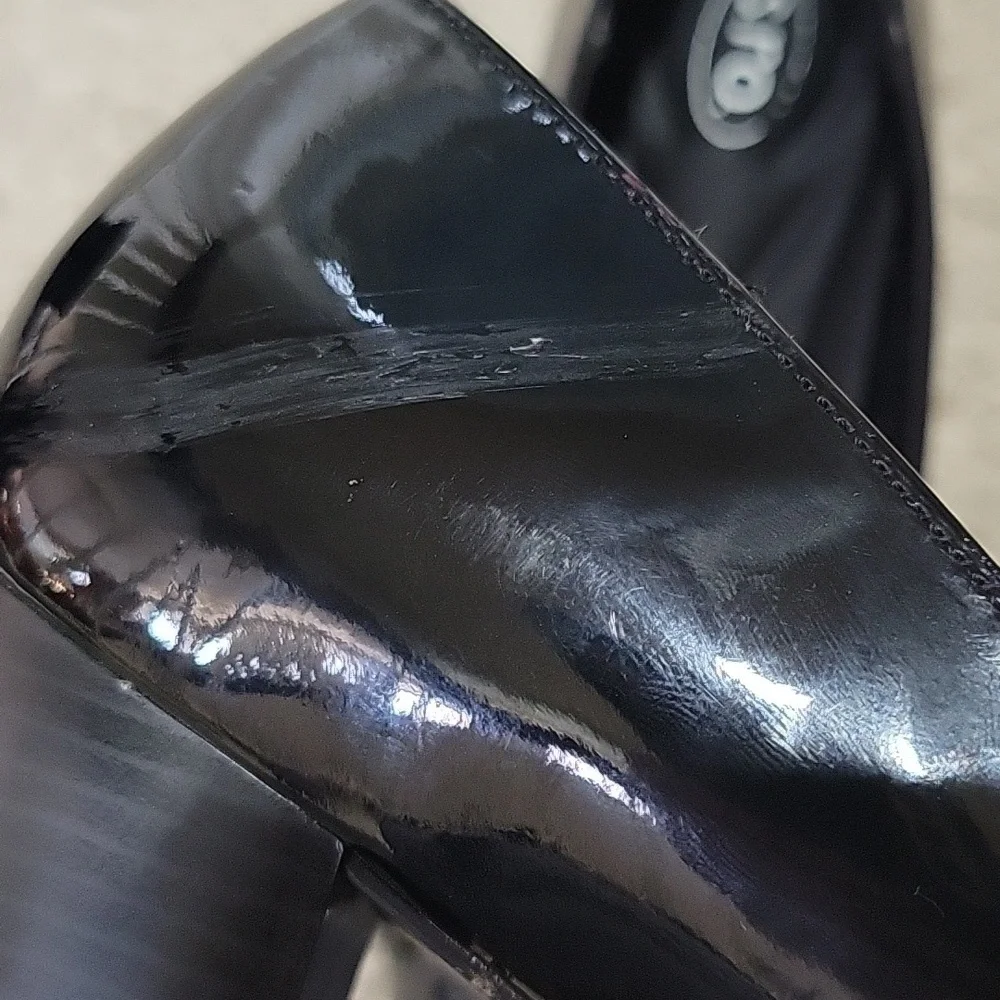 s.r.o. black patent leather heels with gray flannel accent.  Size 9.